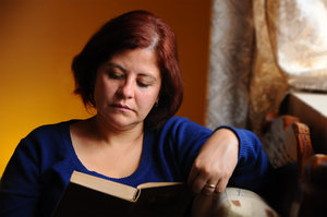 Woman reading at home
