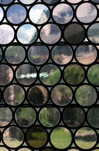 View trough medieval window, t: Stained-glass from middle ages, pattern