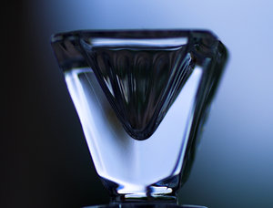 Pyramid glass: Macro shot of inverted pyramid shaped,glass bottle top