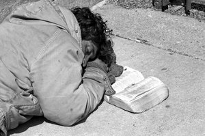 Heaven is my home: Homeless man sleeping with his bible