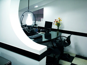 Black and White: Interior photo of my office. I designed it. I especially like the way the colors of the flowers standout.If you like my architectural work or atleast the photography please leave a COMMENT .Feel free to use it for your work.Commercial and Non commercial.T