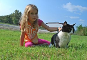 Girl with cat outdoor