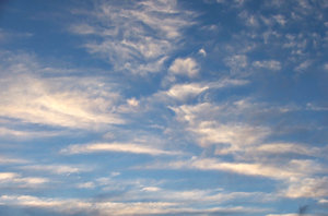clouded sky: thin streaks of fine cloud formations in blue skies