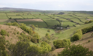 Exmoor valley: A cultivated valley in Exmoor, southwest England, in spring.