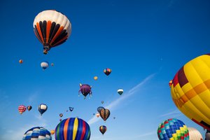 Hot Air Balloons: Hot air balloons in flight, from an annual festival in Saint-Jean-sur-Richelieu, Quebec (Canada). 