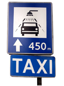 Taxi and car wash sign