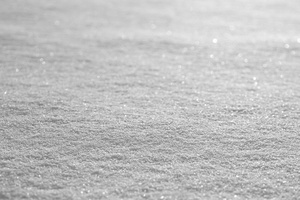 Texture - snow: The surface of snow using a narrow depth of field.